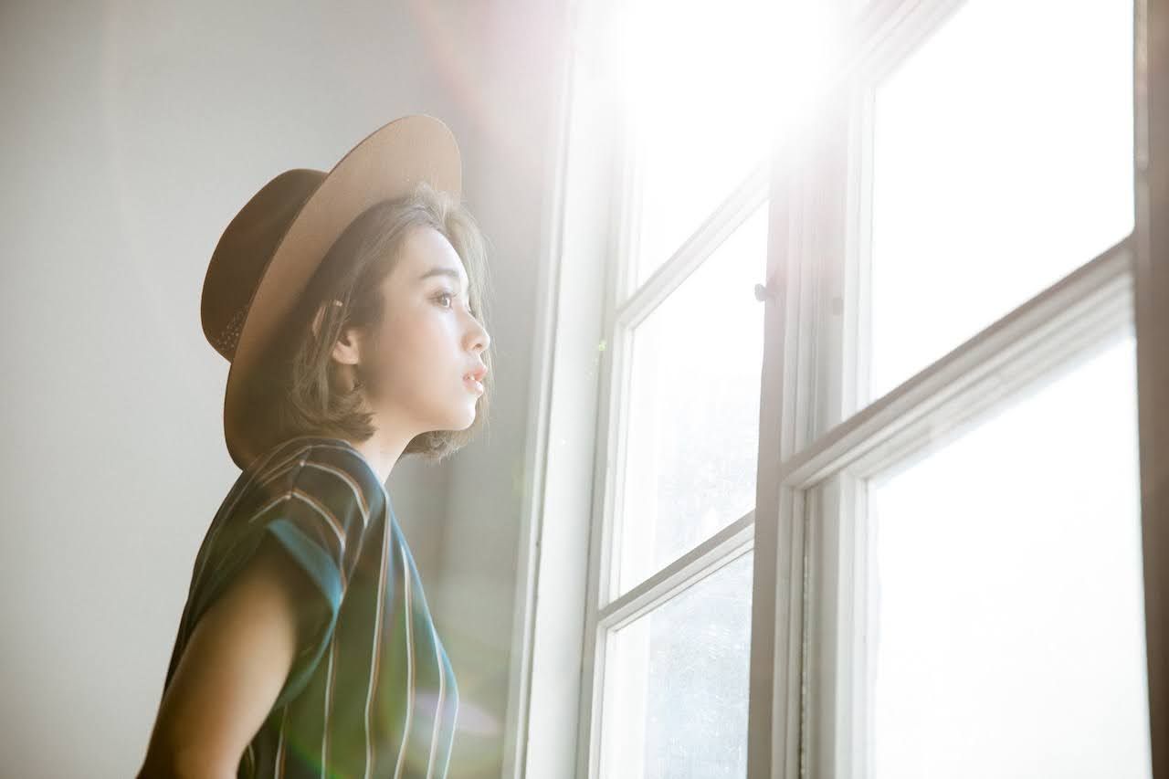 Woman limiting exposure to sun