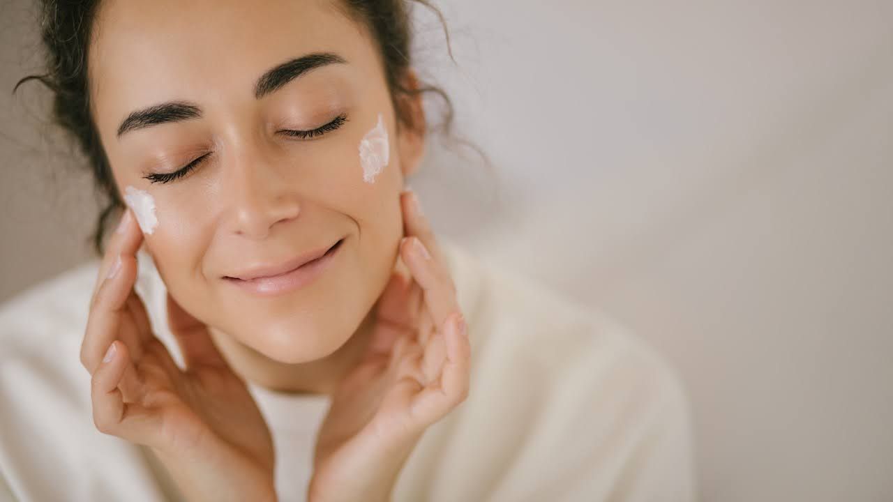 Woman maintaining skin after the chemical peel process