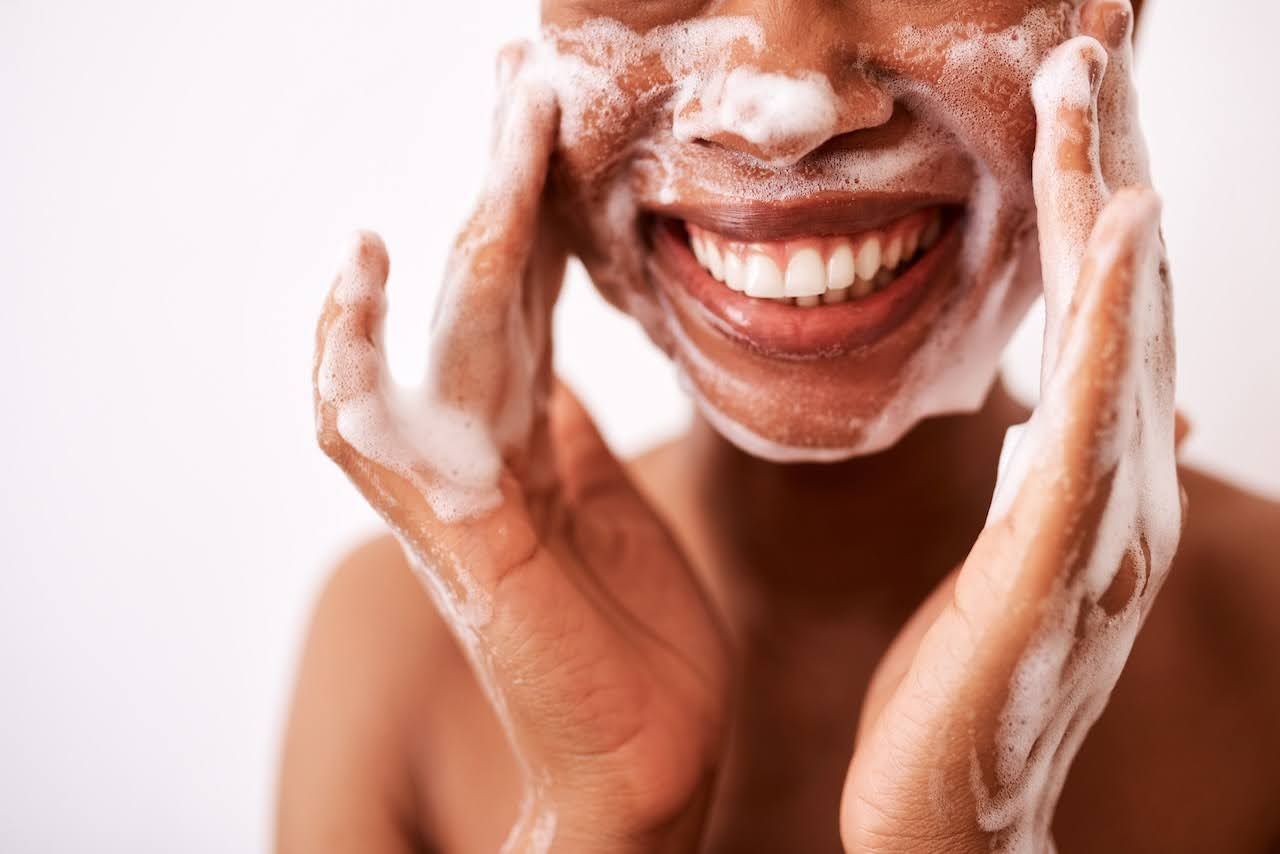 Woman using skincare for eczema