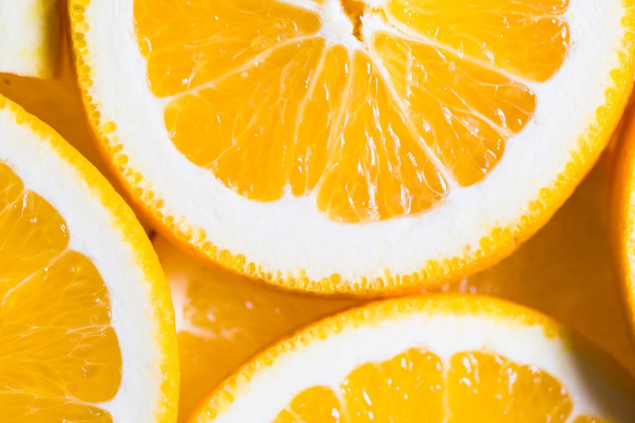 close-up of fresh orange slices representing natural skincare ingredients